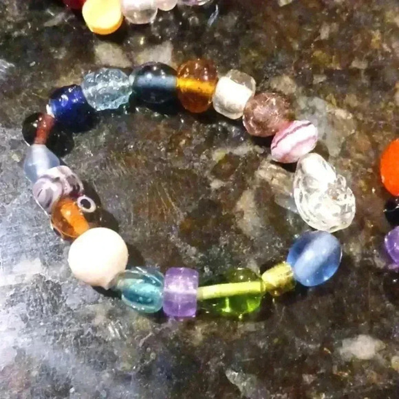 A set of four elastic beaded bracelets..perfect for anyone..size S in Adults - Picture 2 of 5